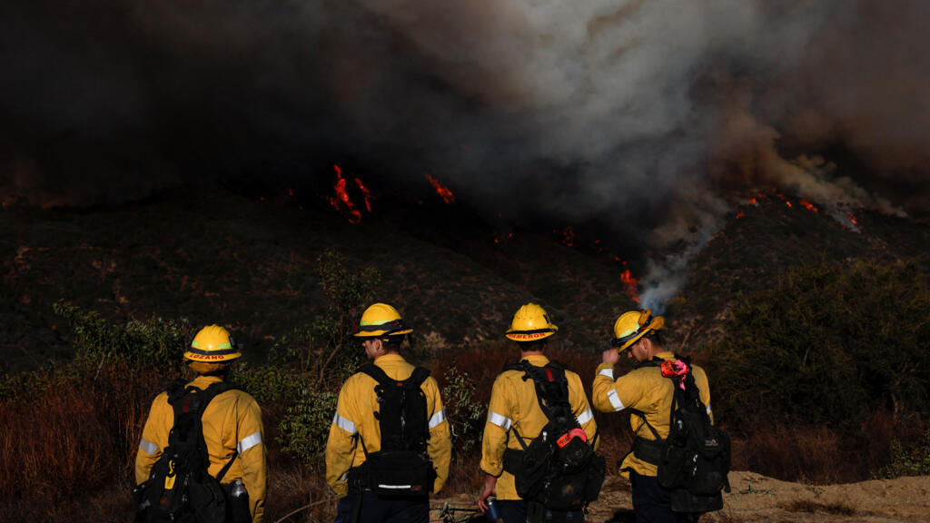 Firefighters continually fight to control Los Angeles wildfires after 3 days